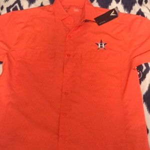 The brand is Antigua made for the Astros. Its a dark orange color size large.